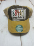 38461 Hampshire colorful letters frayed patch on a denim and yellow legacy hat