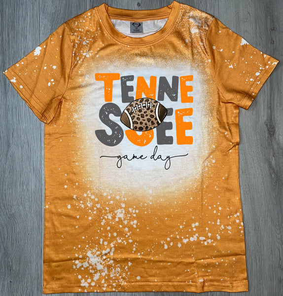 Tennessee Game day with a leopard football designed orange bleached T-shirt