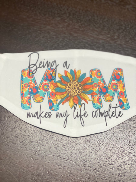 Being a mom makes my Life complete design Face Cover