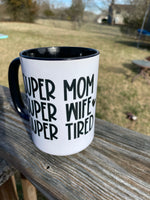 Super Mom, Super Wife, Super Tired design 15 oz. Mug with orange inside and black handle