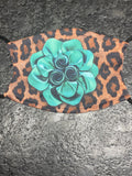 Turquoise leather look flower designed Face Cover with cheetah print background