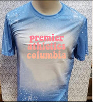 Multi Salmon colored Premier Athletics wording design  Carolina Blue bleached T-shirt