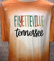Multi color lettering Fayetteville TN designed Orange bleached  designed T-shirt
