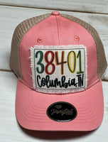 Multi colored 38401 Columbia  designed patch / beige and  coral ponytail hat
